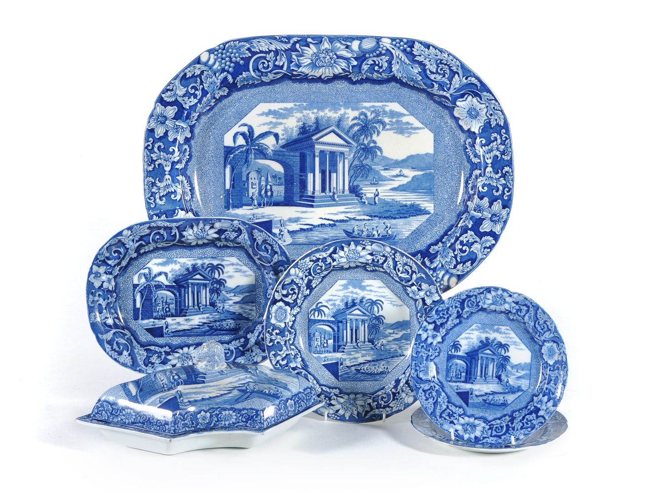 The remnants of a 'Palladian Porch' pattern blue and white printed pearlware dinner service