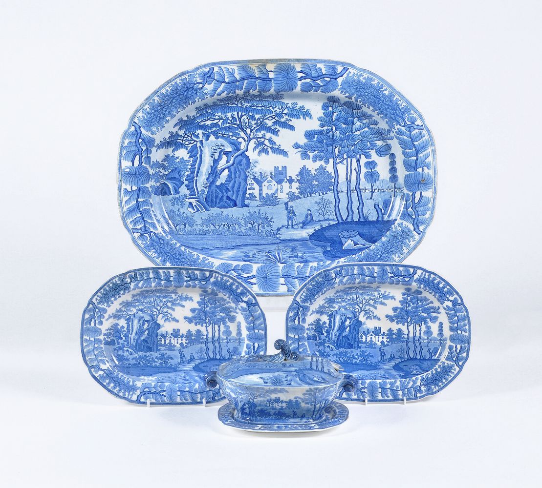 A selection of Davenport blue and white printed pearlware 'Tudor Mansion' pattern dinner wares