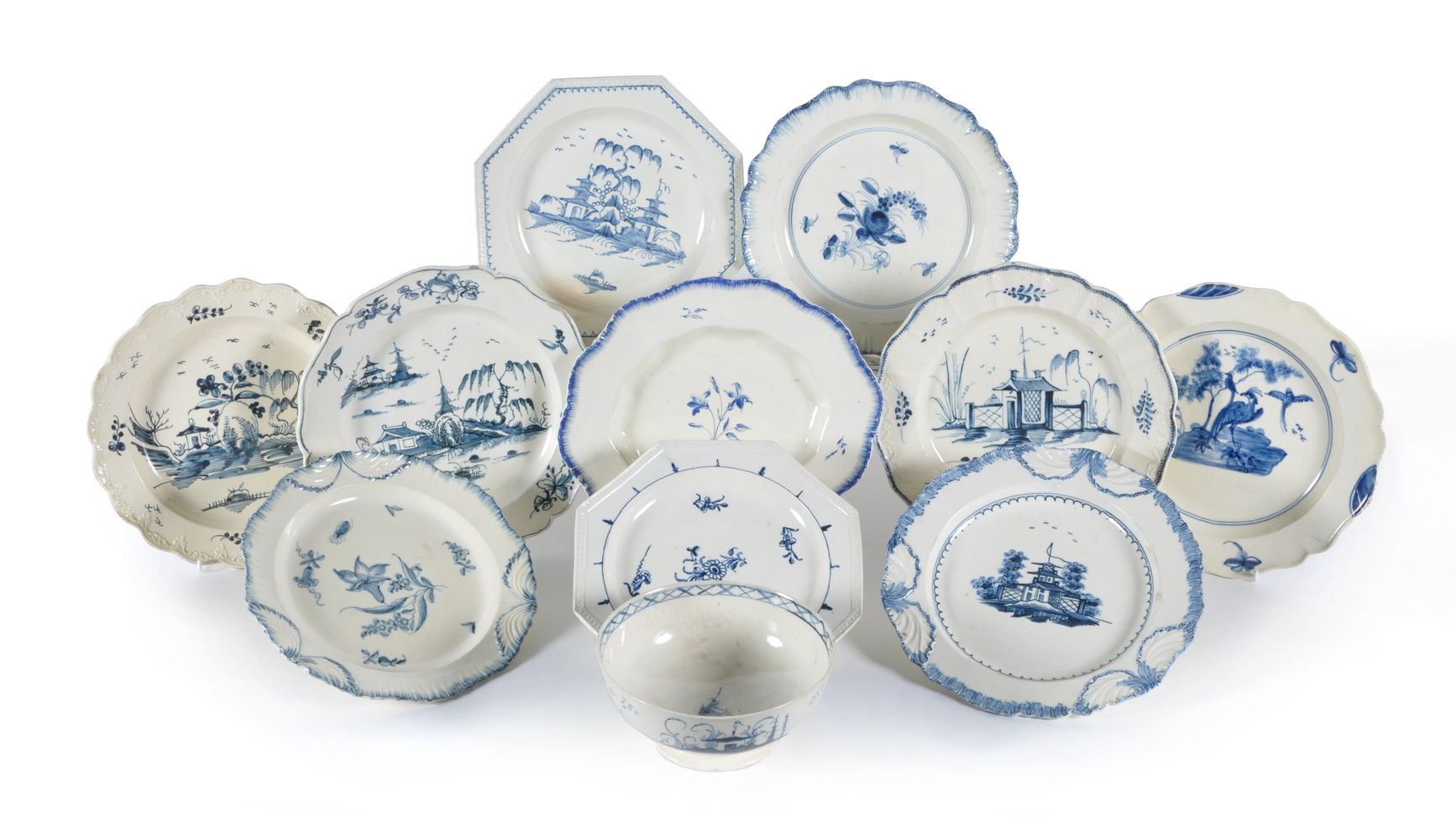 A selection of English blue and white chinoiserie creamware