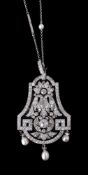 An Edwardian diamond and pearl pendant