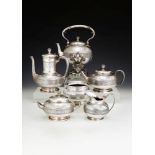 ϒ An American silver six piece tea and coffee service by J. C. Moore & Son for Tiffany & Co.