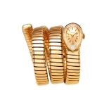 Juvenia for Bulgari, Serpenti, a lady's gold coloured bracelet watch