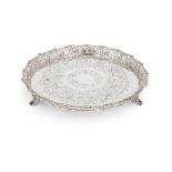 A Portuguese silver circular salver by Joao Joaquim Monteiro & Filho