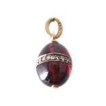 A late 19th century Russian garnet and diamond egg pendant by Karl Bok