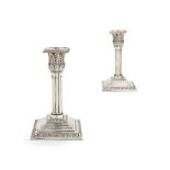 A pair of Victorian silver cluster column candlesticks by Hawksworth, Eyre & Co. Ltd