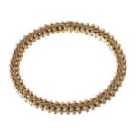 An 18 carat gold bracelet by Carlo Weingrill