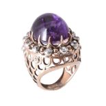 An amethyst and diamond dress ring