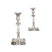 A pair of William IV silver shaped square candlesticks by Creswick & Co.