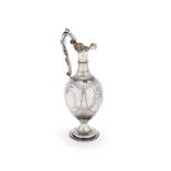 A Victorian silver ovoid pedestal claret jug by Charles Boyton II