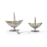 A George III silver navette pedestal cream basket, matching sugar basket and spoon by Charles Hougha