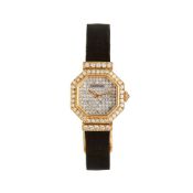 Cartier, a lady's gold coloured and diamond set wrist watch