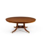 A mahogany and ebonised extending circular dining table, by William Tillman, 20th century