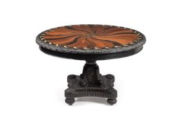 ϒ A Ceylonese ebony and specimen wood inlaid circular centre table