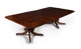 A Regency figured mahogany twin pedestal dining table, circa 1815