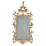 A carved giltwood wall mirror, 19th century