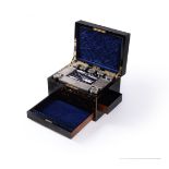 ϒ A Victorian coromandel, brass bound, silver and mother-of-pearl mounted dressing case