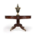 A Regency mahogany drum library table, attributed to Gillows, circa 1815