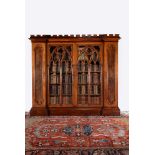 A Gothic Revival oak and pollard oak cabinet bookcase, circa 1880