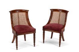 A set of ten mahogany library bergere chairs, in the manner of Gillows, nine of Regency period, circ