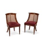 A set of ten mahogany library bergere chairs, in the manner of Gillows, nine of Regency period, circ