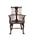 A George II elm and yew 'comb' back Windsor armchair, mid-18th century