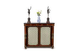 ϒ A matched pair of rosewood and gilt metal mounted side cabinets, circa 1815