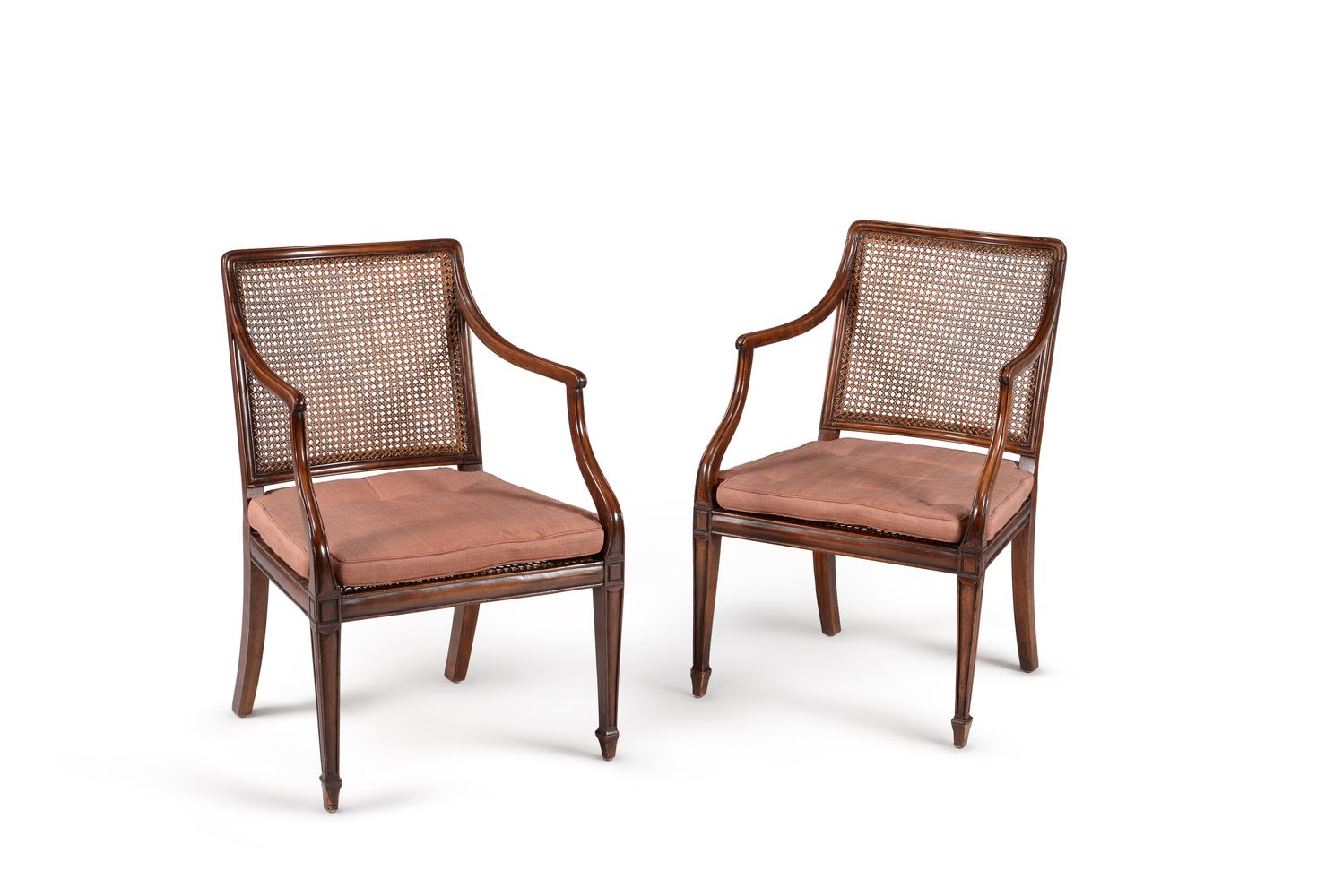 A set of six George III beech bergere armchairs, circa 1810, in the manner of Gillows