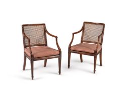 A set of six George III beech bergere armchairs, circa 1810, in the manner of Gillows