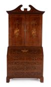 A George III mahogany and marquetry inlaid bureau bookcase, circa 1800