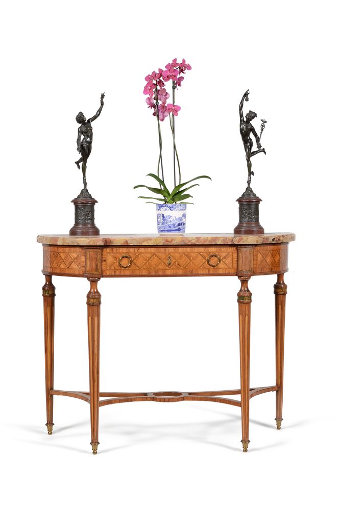 ϒ A Louis XVI tulipwood, rosewood and sycamore inlaid console table, circa 1780