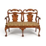 A walnut chair back settee, in George II style, 19th century