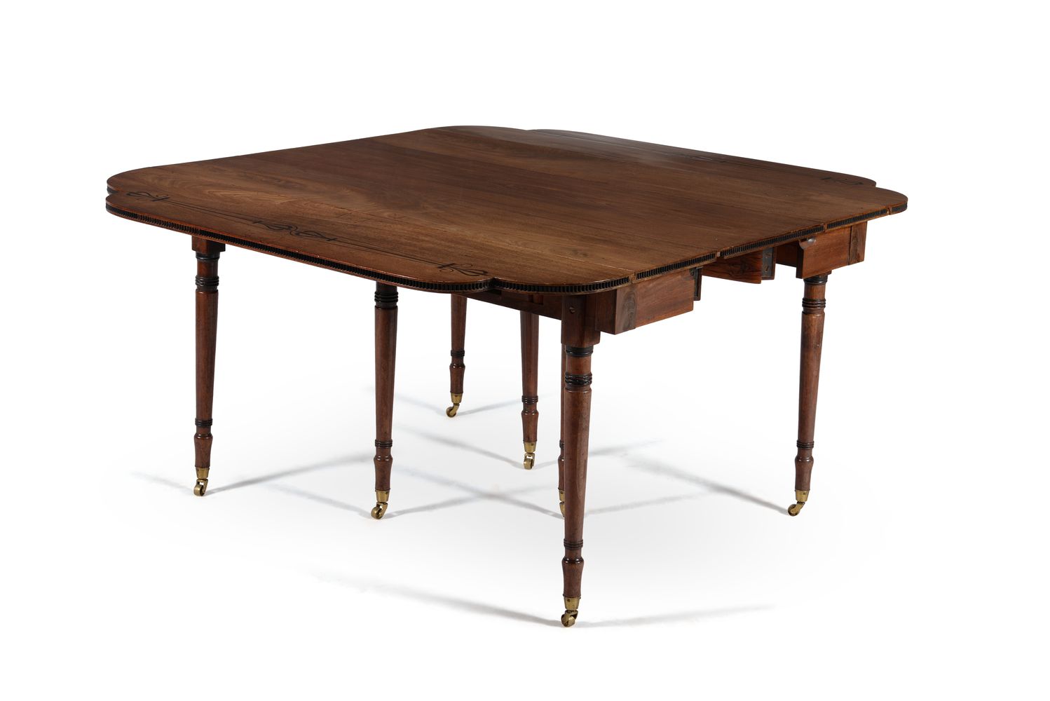 ϒ A Regency mahogany and ebony inlaid concertina action extending dining table, circa 1815 - Image 2 of 10