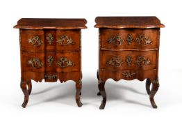 A matched pair of Continental walnut commodes, late 18th/early 19th century