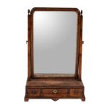 A George II walnut and feather banded dressing mirror, circa 1735