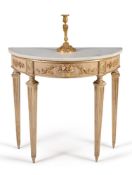 A pair of Continental cream painted and parcel gilt demi-lune console tables, late 18th century