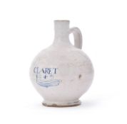 A dated London delft wine bottle, 1642