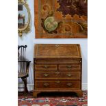 A George I oak, pollard oak and feather banded bureau, circa 1720