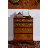 A George III oak chest of drawers, circa 1780