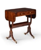 A Regency mahogany and crossbanded sofa table, circa 1815, of rare small proportioned design