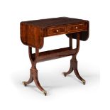 A Regency mahogany and crossbanded sofa table, circa 1815, of rare small proportioned design