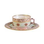 A Royal Worcester reticulated cup and saucer of George Owen type, last quarter 19th century