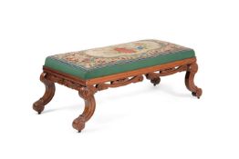 A William IV mahogany and needlework upholstered long stool, circa 1825