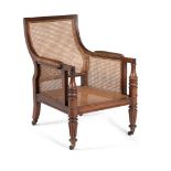 † A Regency mahogany bergère library armchair, circa 1815