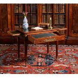 An Empire mahogany and gilt metal mounted writing table, circa 1810