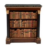 A pair of Regency parcel gilt and rosewood open bookcases, circa 1815