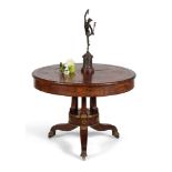 A Louis Philippe mahogany and gilt metal mounted drum library table, circa 1840