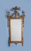 A Continental carved giltwood and gesso wall mirror, circa 1790-1820