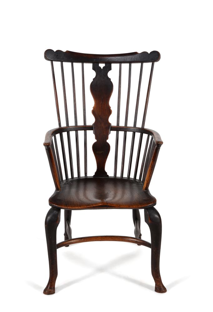 A George II elm, ash and walnut 'comb' back Windsor armchair, mid-18th century