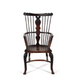 A George II elm, ash and walnut 'comb' back Windsor armchair, mid-18th century