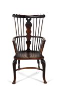 A George II elm, ash and walnut 'comb' back Windsor armchair, mid-18th century